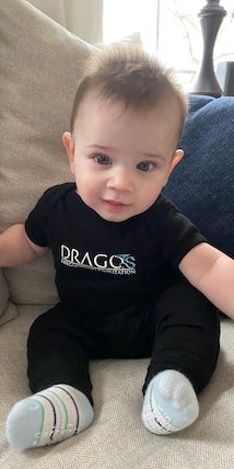 baby in Dragos onesie