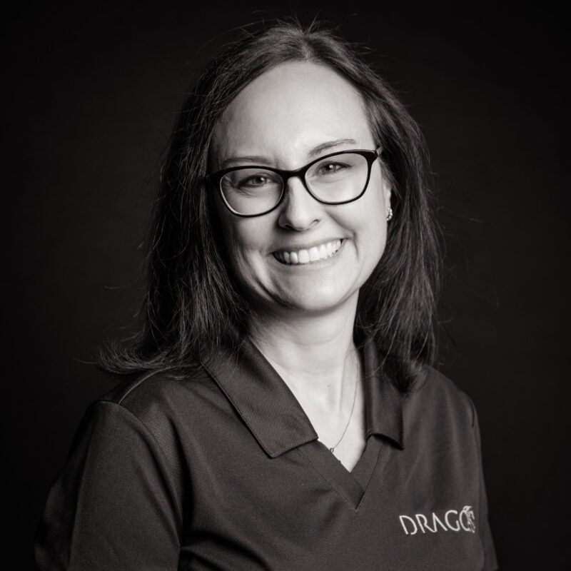 A black and white headshot of Jodi Schatz, the VP of Engineering at Dragos