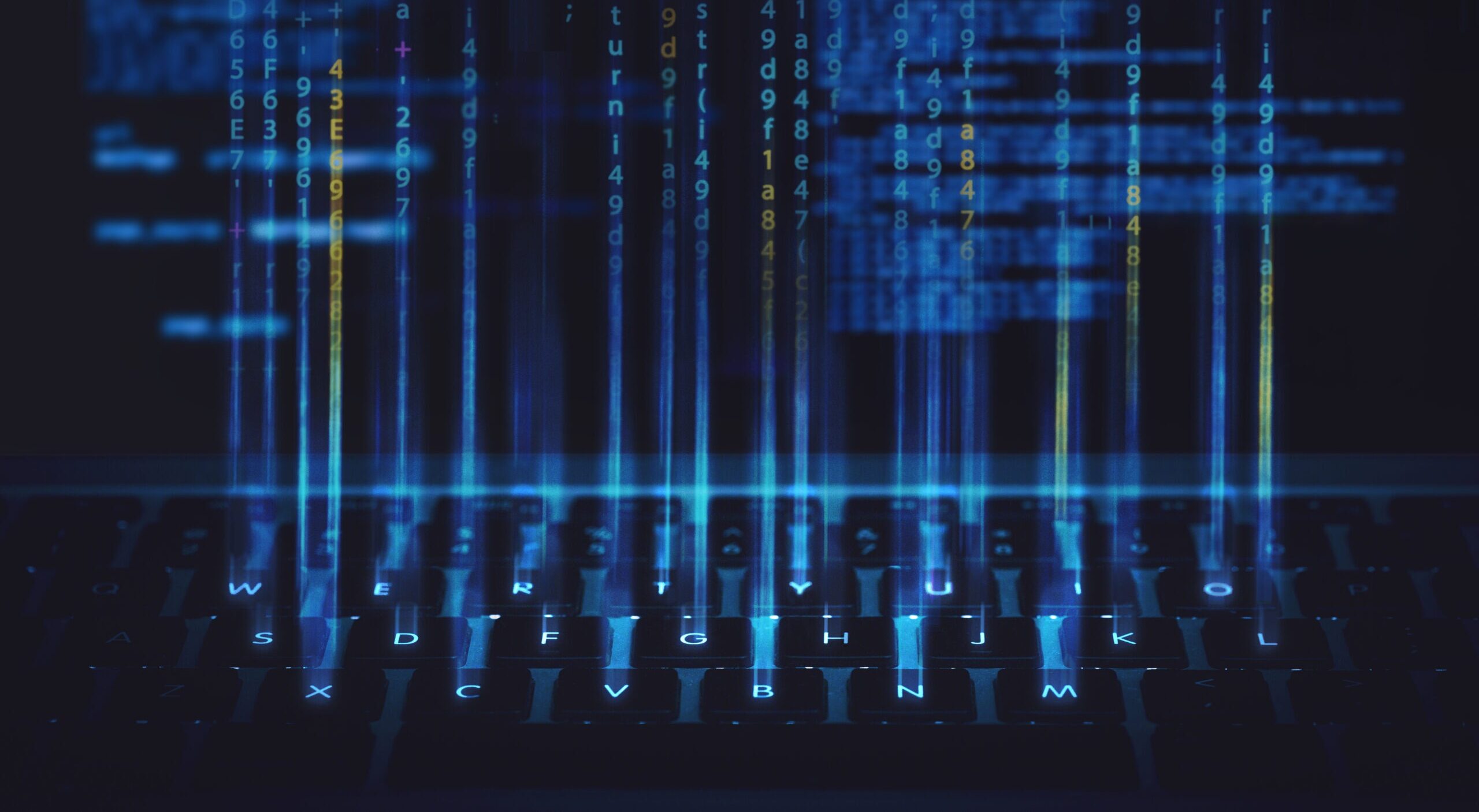 code and keyboard blue background ethical hacking concept