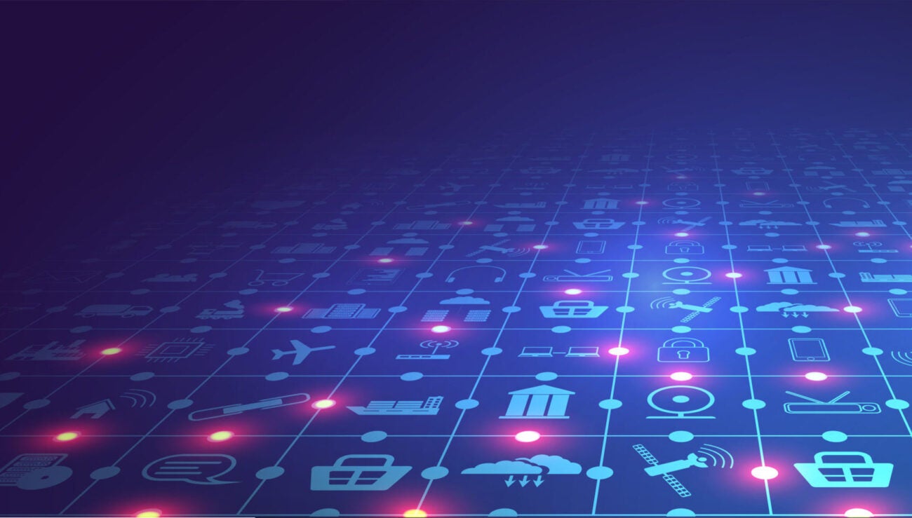 Internet of things (IoT) and networking concept for connected devices. Spider web of network connections with on a futuristic blue background. Wireless connections of information technology.