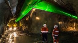Miners inspecting an underground ventilation system in a gold mine in Australia