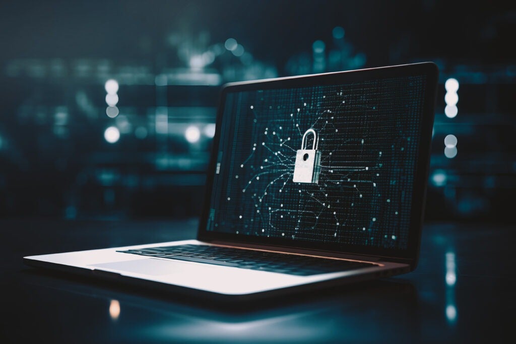 Cyber security, data protection concept, digital design. A laptop in front of a digital blue background with a lock on the laptop screen. Threats. 

Cover image for webinar from Dragos, Know Your Adversaries: A Fireside Chat on The European Operational Technology Threat Landscape.
