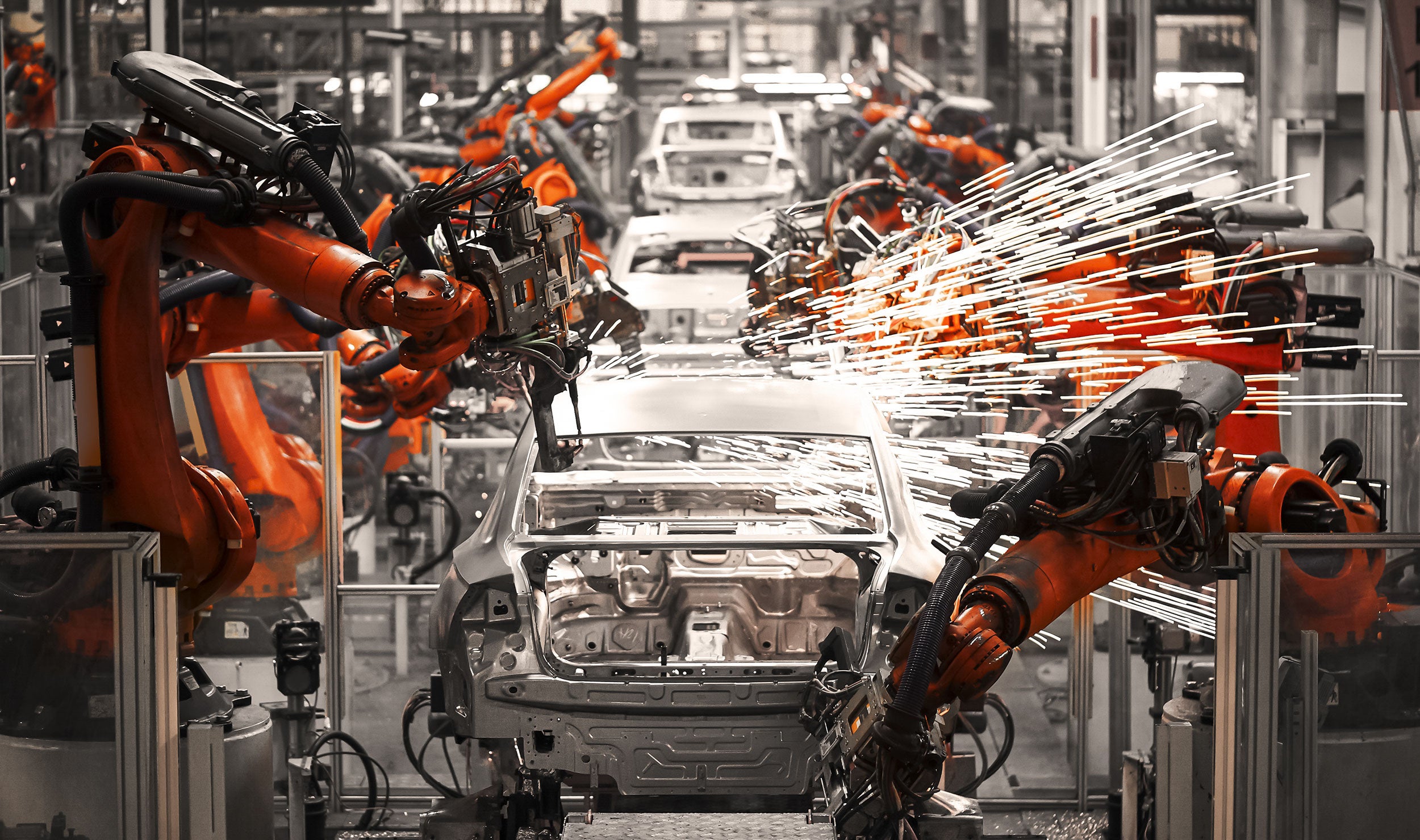 Robots on an automobile manufacturing line